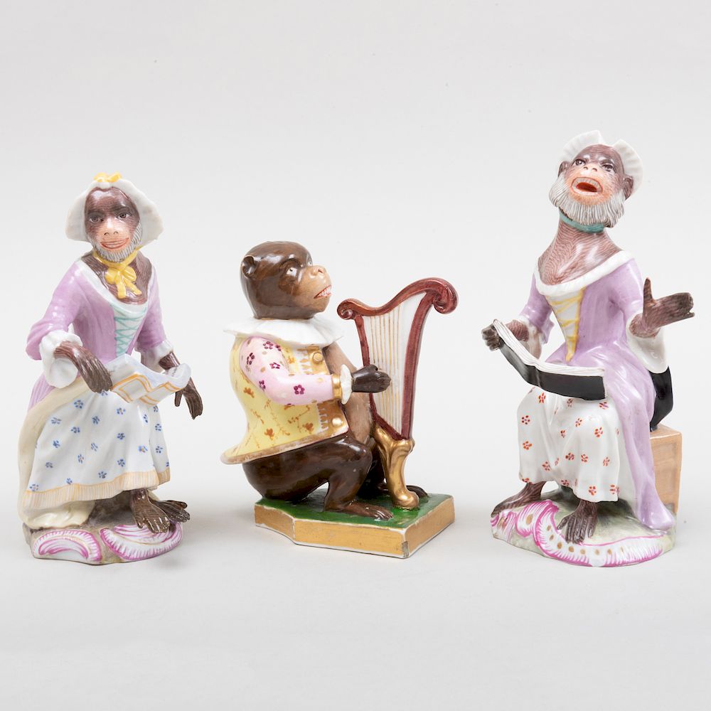 Appraisal: Derby Porcelain Monkey Band Figure of a Harpist and Two