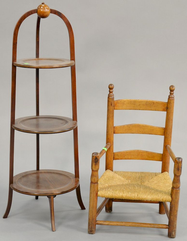 Appraisal: Two piece lot to include primitive child's ladder back armchair