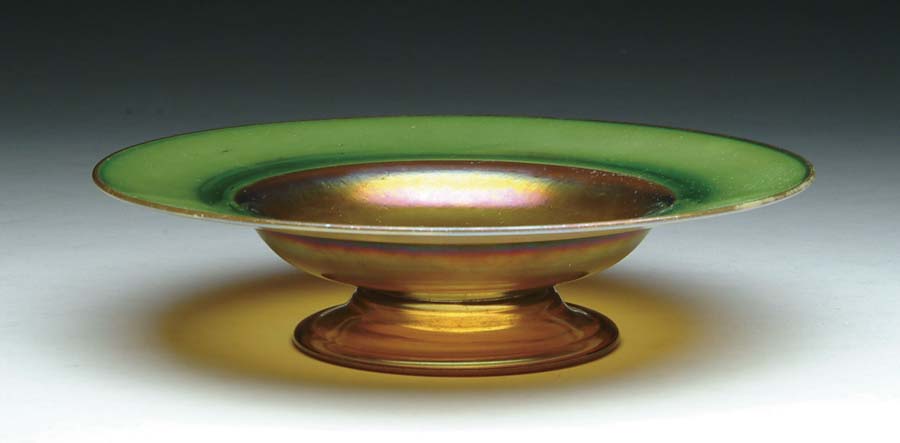 Appraisal: QUEZAL COMPOTE Beautiful Quezal compote features a green iridescent rim