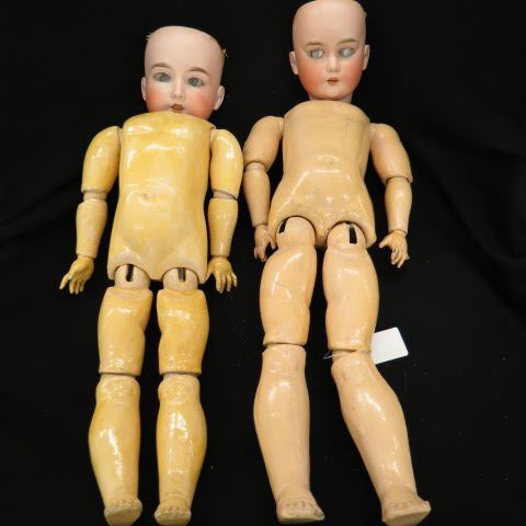 Appraisal: Bisque Head Victorian Dolls with bodys not attached as found