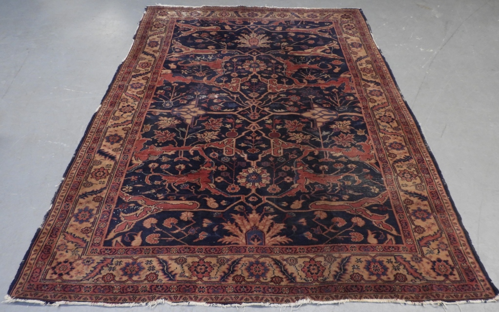 Appraisal: TURKISH ISPARTA RUG Turkey th CenturyRed and yellow geometric floral