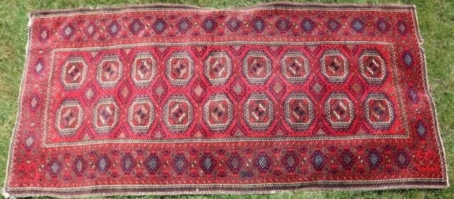 Appraisal: CA TURKOMAN SCATTER RUG RED FIELD WITHGEOMETRIC DESIGN SMALL TEAR