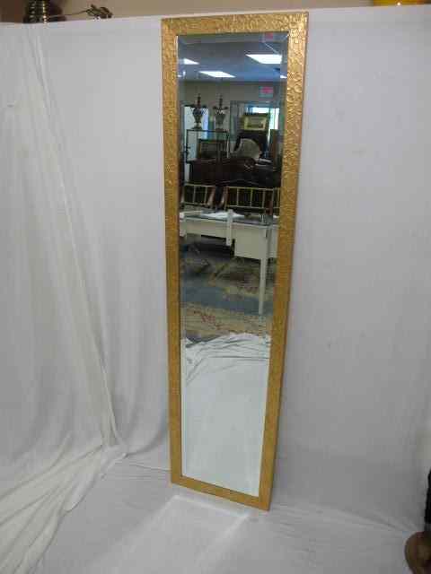 Appraisal: A th century wood framed gold leaf beveled dressing mirror