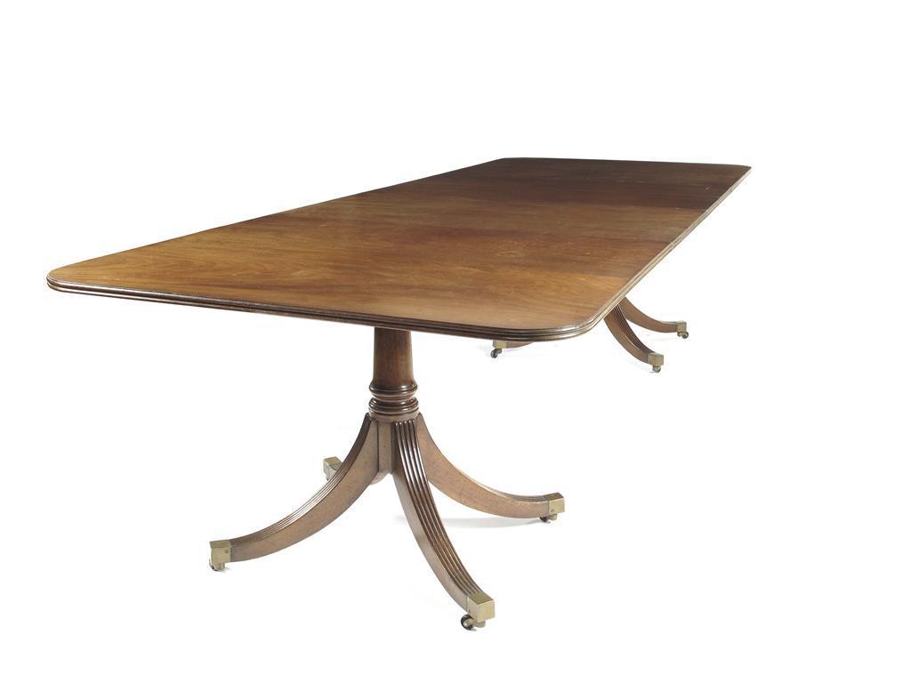 Appraisal: A mahogany twin pedestal dining table by RBC