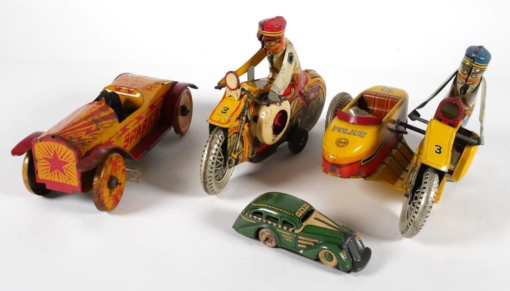 Appraisal: VINTAGE MARX TIN LITHO WIND-UP TOYSLot of four toys including