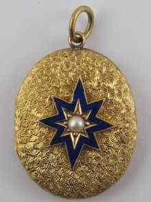 Appraisal: A yellow metal tests carat gold oval locket engraved with