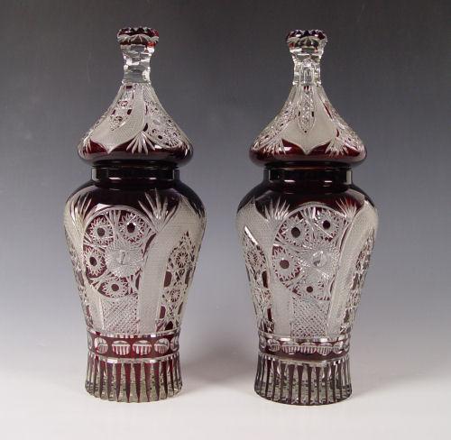 Appraisal: PAIR BOHEMIAN GLASS RUBY CUT TO CLEAR TALL COVERED VASES