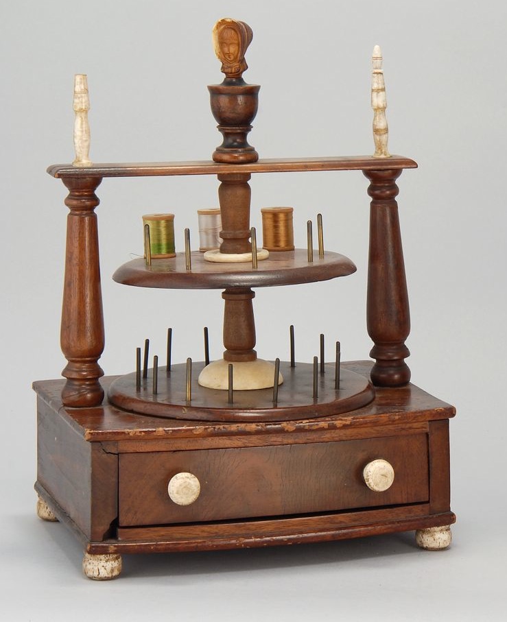 Appraisal: ONE-DRAWER SEWING BOX WITH SPOOL HOLDER SURMOUNT th CenturyIn walnut