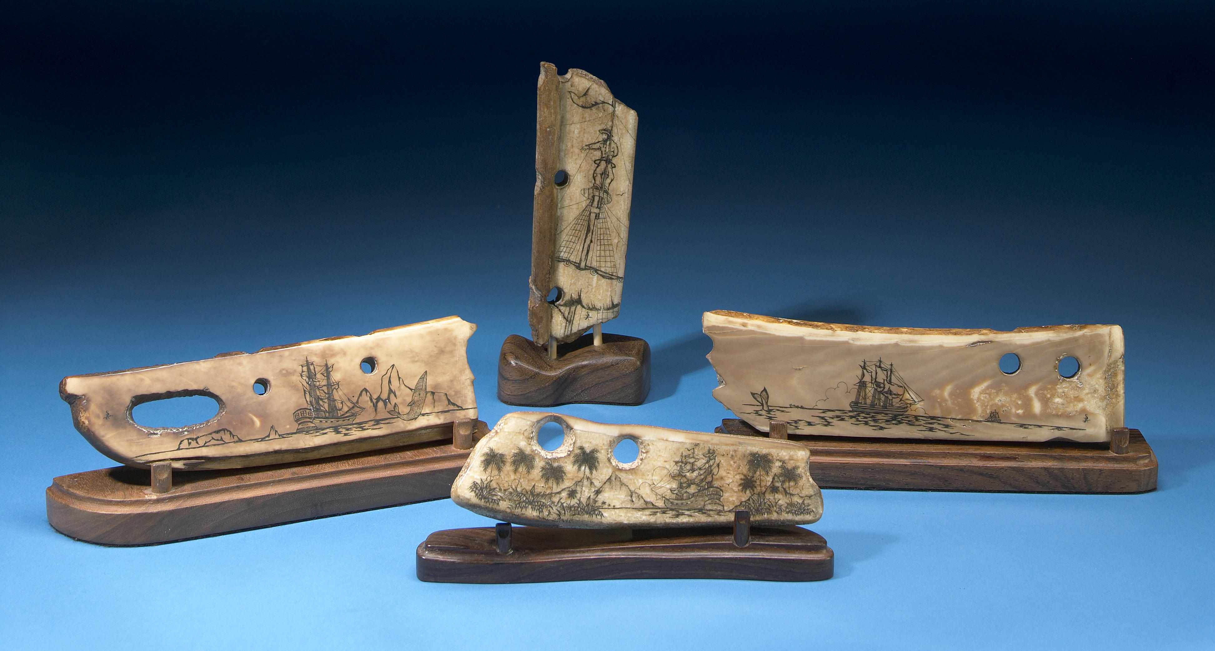 Appraisal: Collection of Four Scrimshaw Fossil Walrus Ivory Items AlaskaFour Eskimo