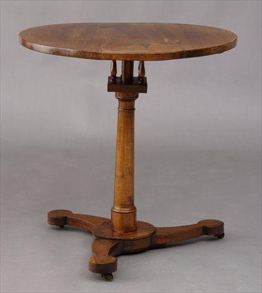 Appraisal: BIEDERMEIER CIRCULAR-TOP TRIPOD TABLE Turned stem and tripart base in