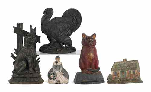 Appraisal: Five cast iron doorstops tallest - h