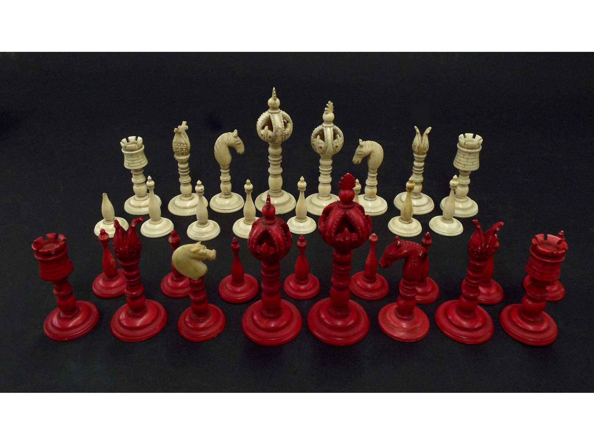 Appraisal: Chinese carved ivory harlequin chess set height of king at