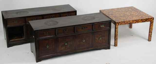 Appraisal: A pair of carved hardwood chests each with two roundels