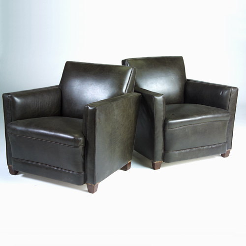 Appraisal: ART DECO Pair of club chairs upholstered in dark green