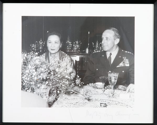 Appraisal: Signed photograph showing Madame Chiang Kai-shek with General Lemnitzer at