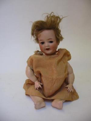 Appraisal: A Cuno Otto Dressel bisque head crying girl doll with