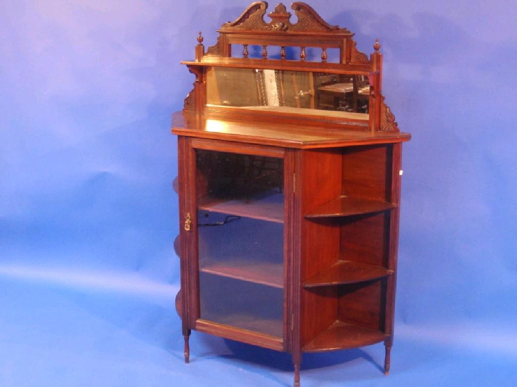 Appraisal: A Victorian mahogany sideboard with a galleried and mirrored back