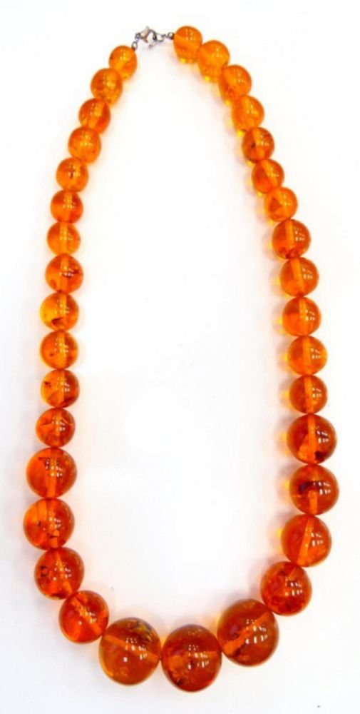 Appraisal: GRADUATING BEADED FAUX BUTTERSCOTCH AMBER NECKLACE A faux butterscotch amber