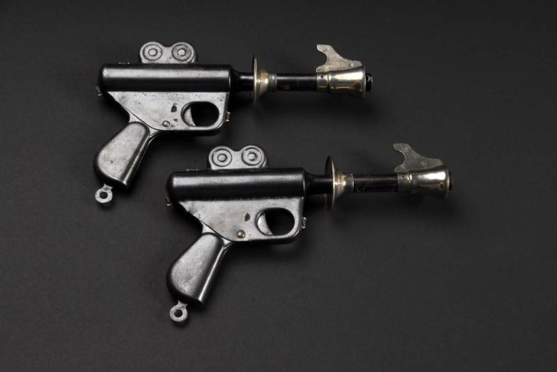 Appraisal: Lot of Buck Rogers Pop Guns Description Manufactured by USA