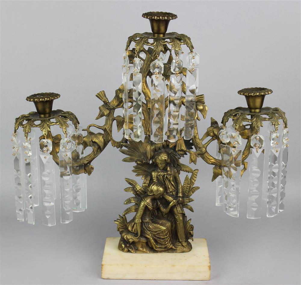 Appraisal: LATE VICTORIAN GILT METAL FIGURAL THREE-LIGHT MANTEL CANDELABRUM modeled as