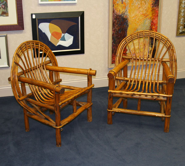 Appraisal: Pair Adirondack style bent twig arm chairs with steam bent