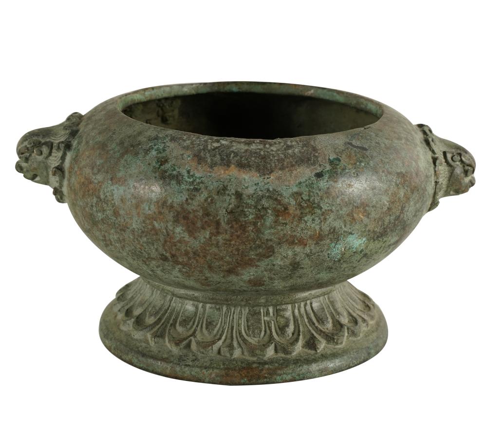 Appraisal: CHINESE BRONZE FOOTED BOWLsigned to underside flanked by lion's mask