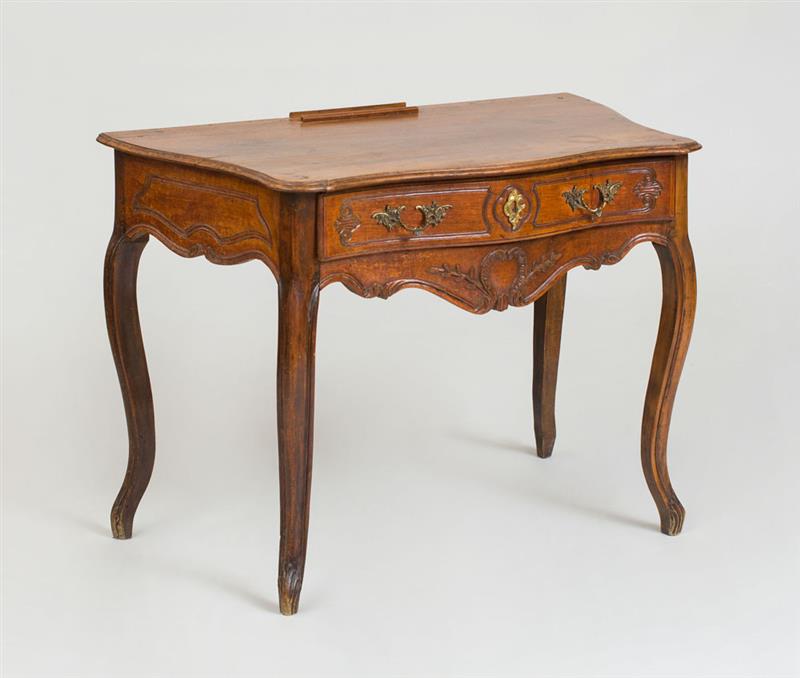 Appraisal: LOUIS XV PROVINCIAL CARVED FRUITWOOD SIDE TABLE Fitted with one