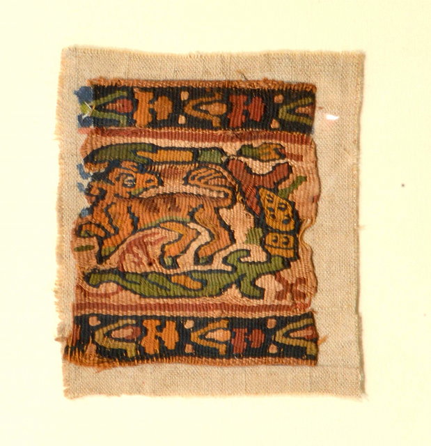 Appraisal: A TAPESTRY FRAGMENT depicting a horse within a double black