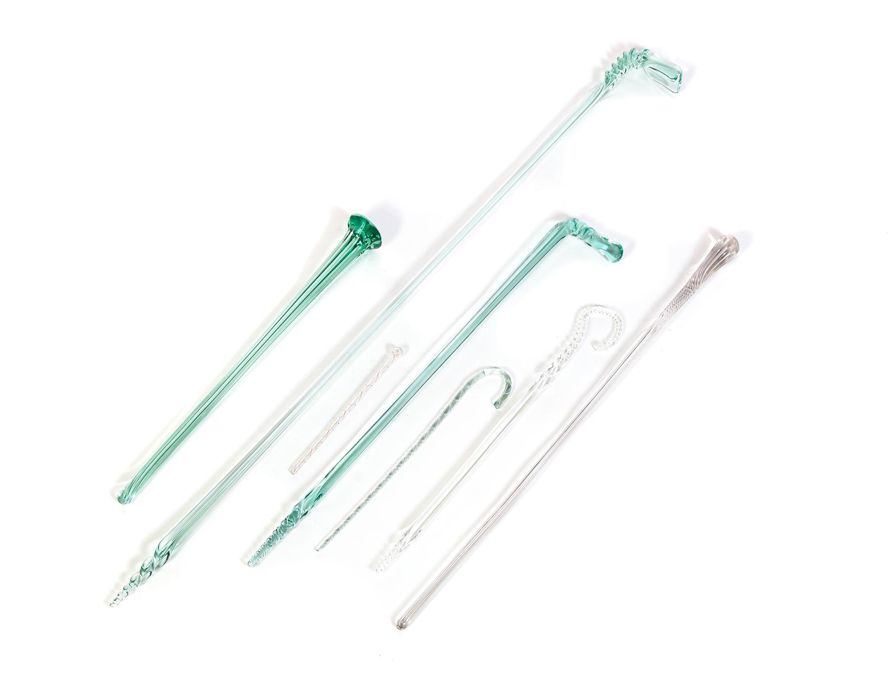 Appraisal: SEVEN GLASS CANES American th century l to l Imperfections