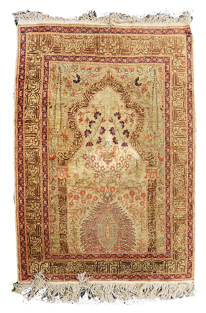 Appraisal: A TURKISH PRAYER RUG with stylised script main border on