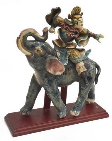 Appraisal: Chinese glazed pottery figural roof tile warrior astride an elephant