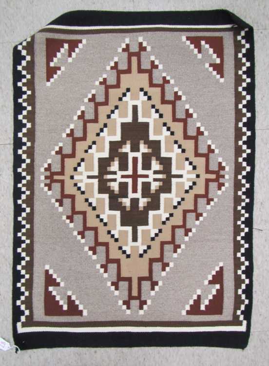 Appraisal: TWO GREY HILLS NAVAJO WEAVING having black grey white and