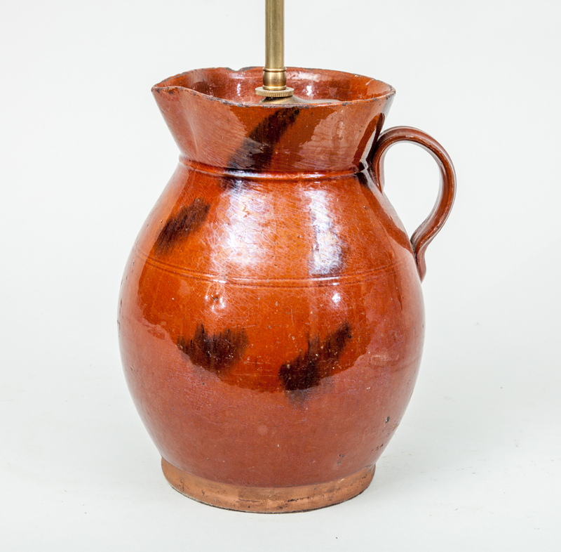 Appraisal: RED GLAZED POTTERY PITCHER MOUNTED AS A LAMP and in