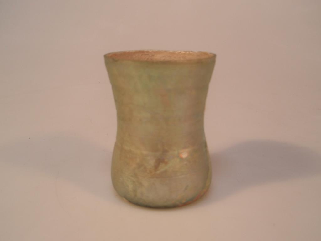 Appraisal: A Roman yellowish-green glass beaker with a cut-off and ground