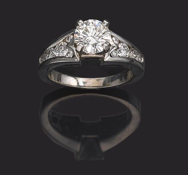 Appraisal: A diamond solitaire ring centering a round brilliant-cut diamond weighing