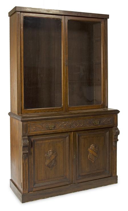 Appraisal: An early th century oak bookcase undercabinet the plain cornice