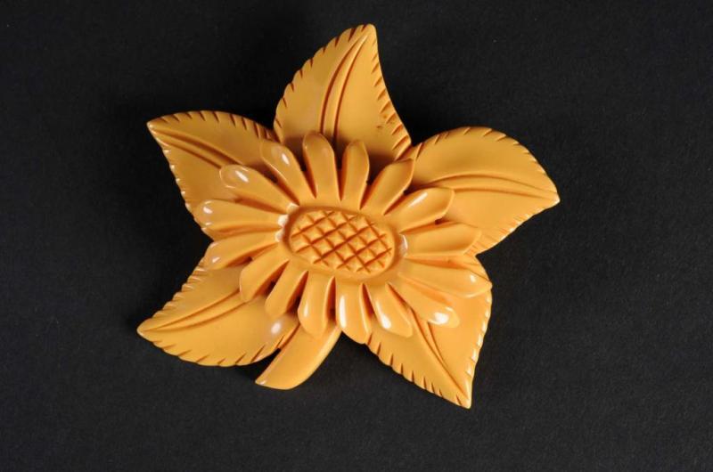 Appraisal: Bakelite Yellow Flower Pin Condition Excellent Size L