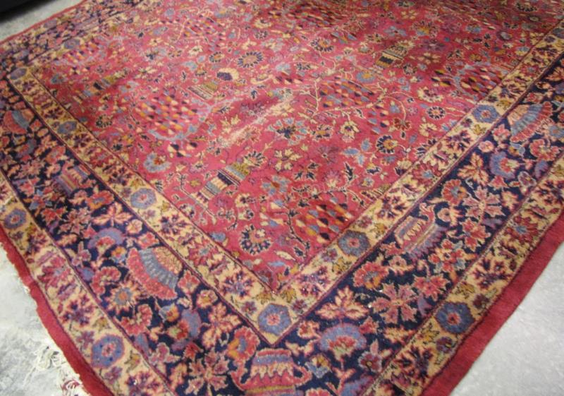 Appraisal: Semi-antique Oriental room size rug red field damage and wear