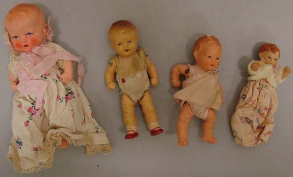 Appraisal: Lot Painted bisque baby toddler dolls with original clothing ARI