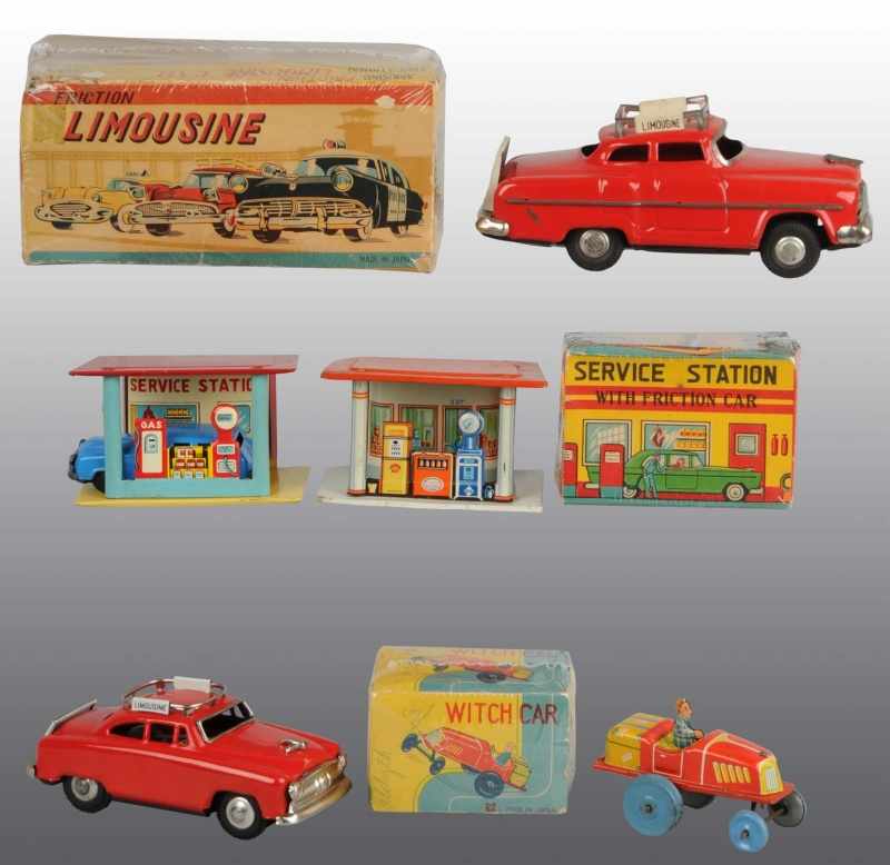 Appraisal: Lot of Tin Automobile Friction Wind-Up Toys Description Japanese Working