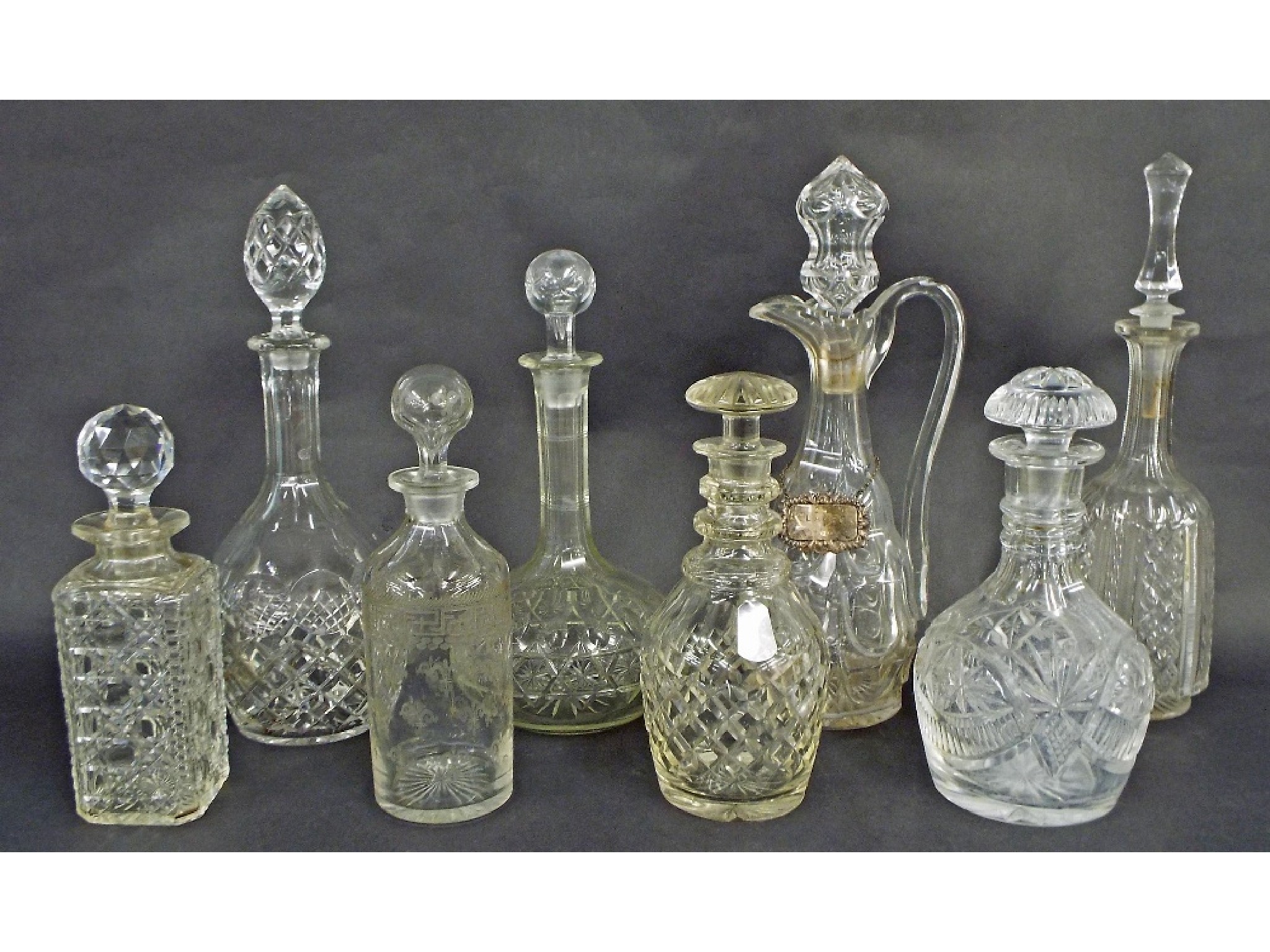 Appraisal: Collection of seven various cut glass decanters to include a