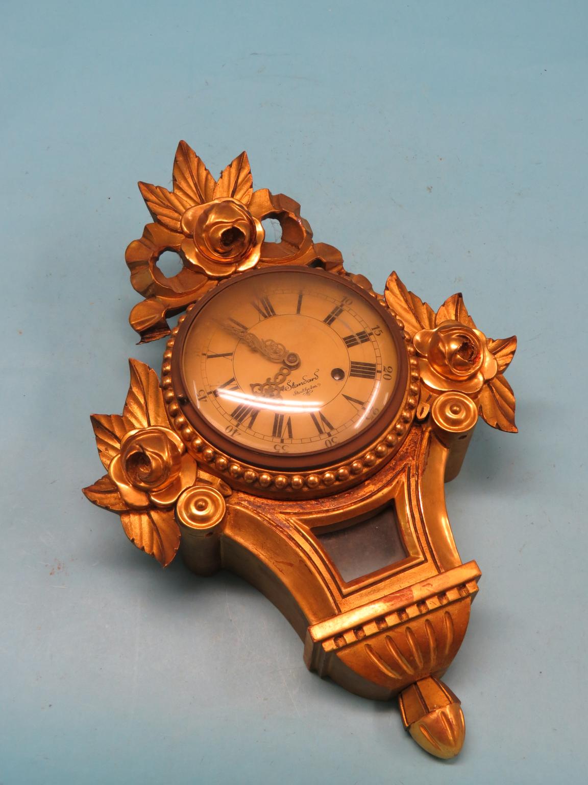 Appraisal: A th century giltwood wall clock dial signed Standard Stockholm