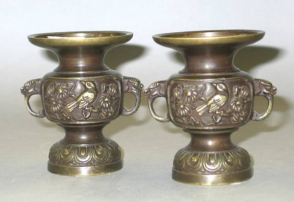 Appraisal: A pair of miniature cast bronze vases Meiji Period Each