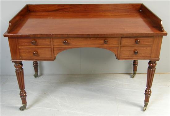 Appraisal: Victorian mahogany writing desk with raised back over five drawers