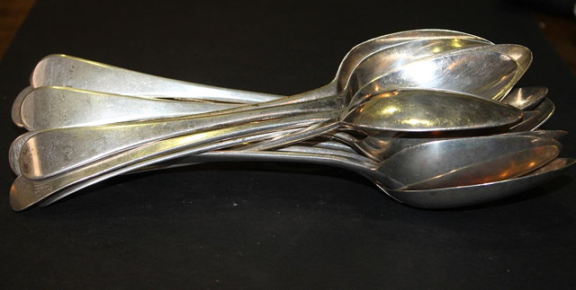 Appraisal: A COLLECTION OF EIGHTEEN OLD ENGLISH PATTERN SILVER TABLE SPOONS