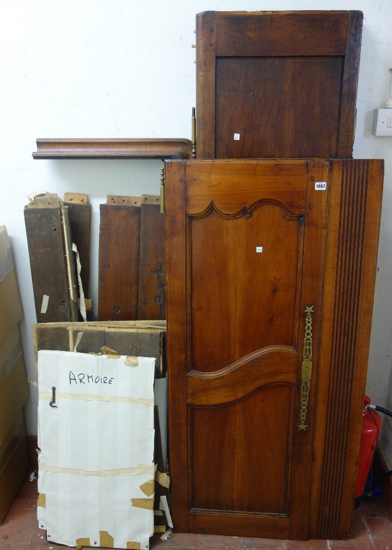 Appraisal: A th century French fruitwood two door armoire on pointed