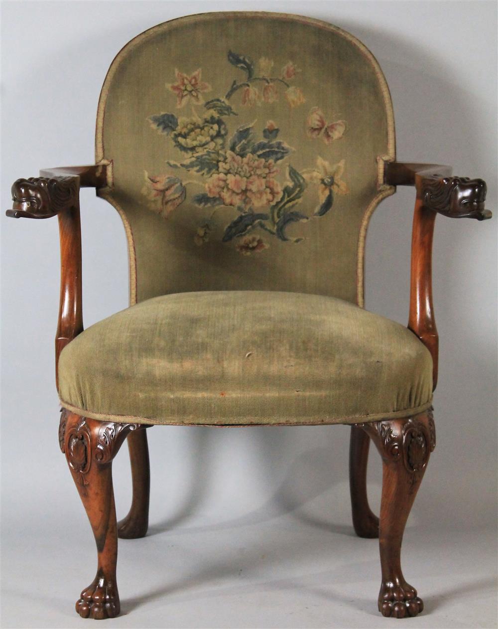 Appraisal: GEORGE I STYLE CARVED MAHOGANY ARMCHAIR having a rounded back