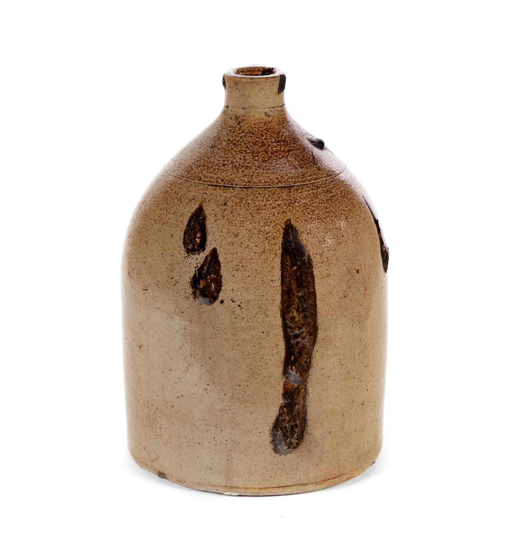 Appraisal: AMERICAN STONEWARE JUG Southern mid th century Heavy glaze drips