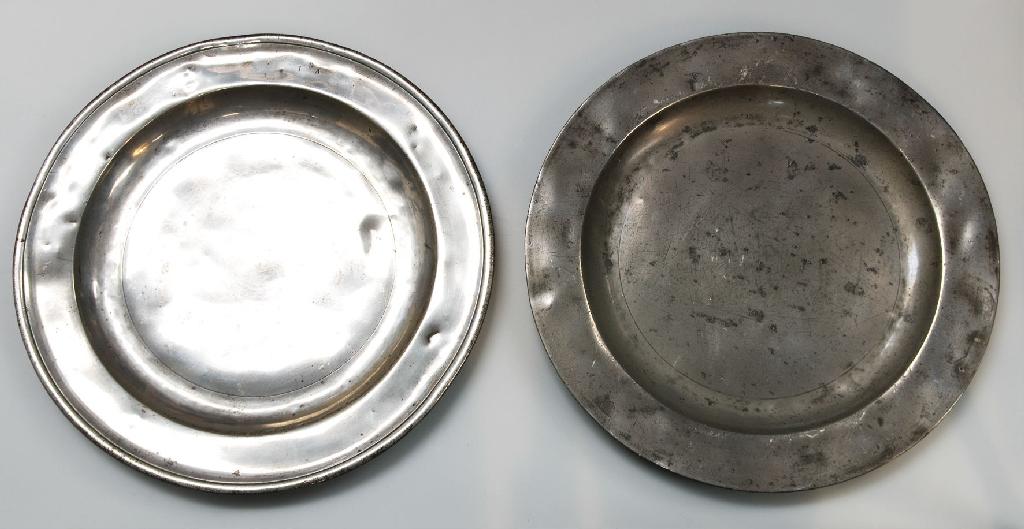 Appraisal: TWO PEWTER CHARGERS th CENTURY the first with folded rim