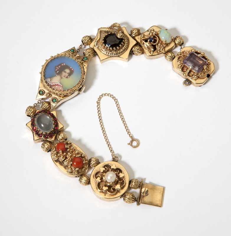 Appraisal: A Victorian gem-set and gold slide watch bracelet Each gem-set